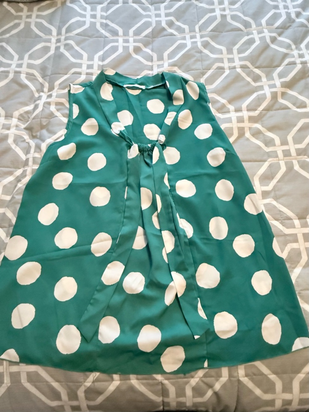 Green Polka Dot Sleeveless Blouse with Tie Neck